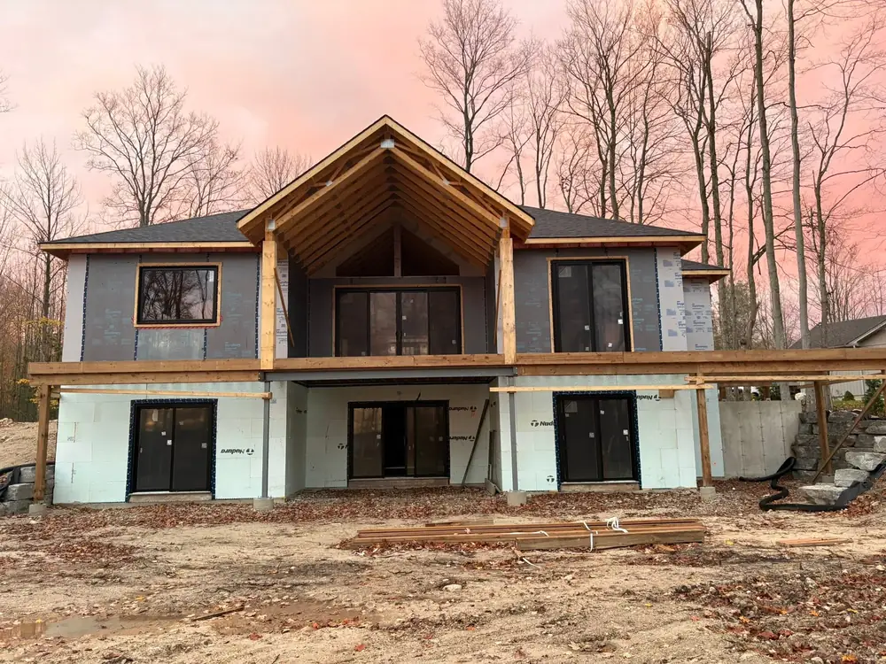 Two storey custom home closed in at sunset